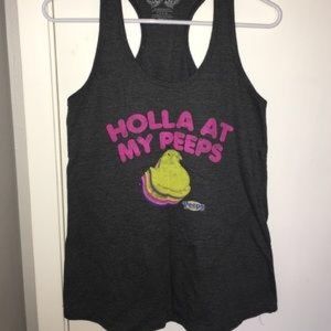 Dark grey tank, large but fits like a medium