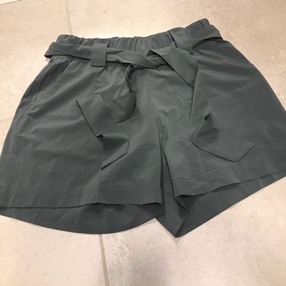 Green belted shorts