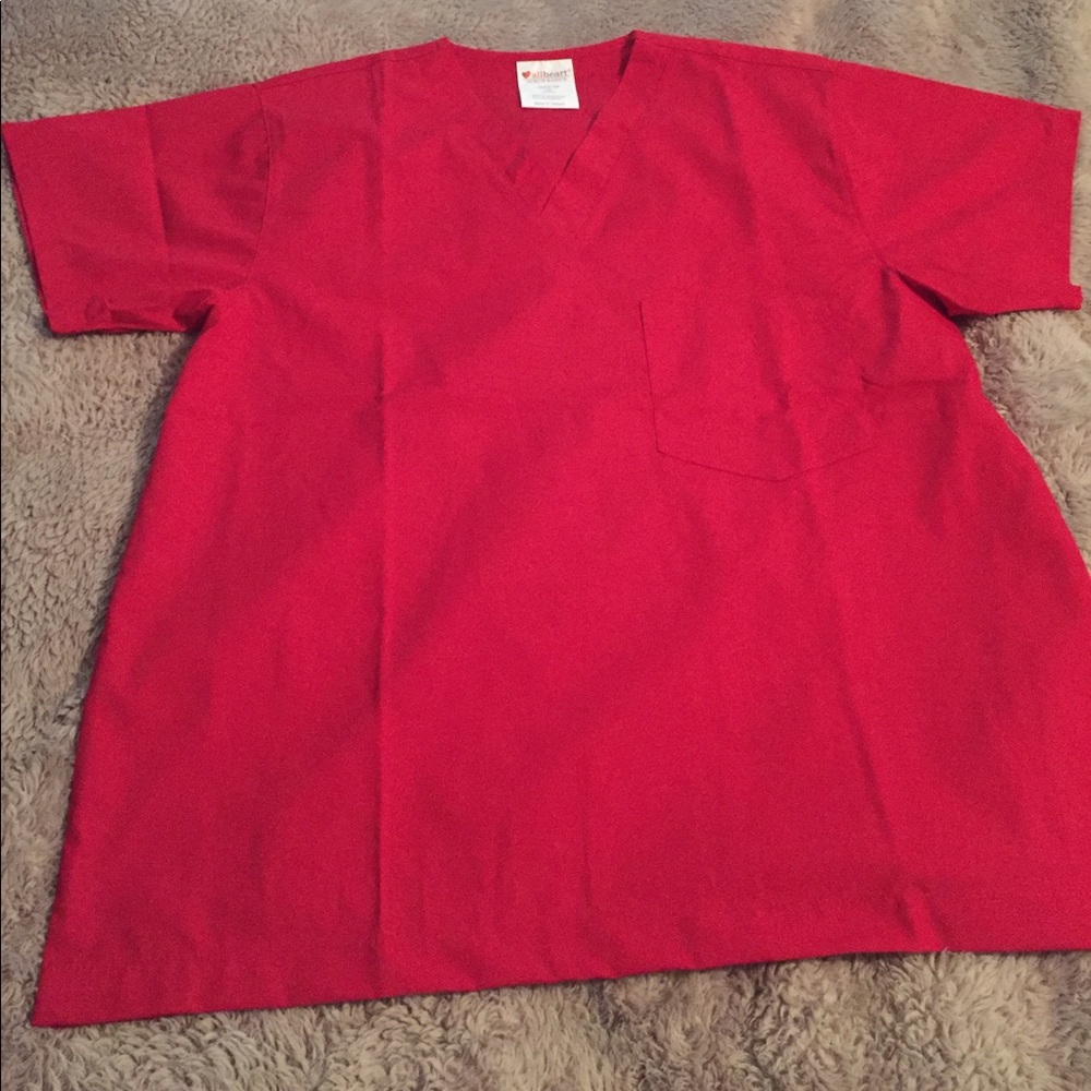 New red scrub top, never worn.
