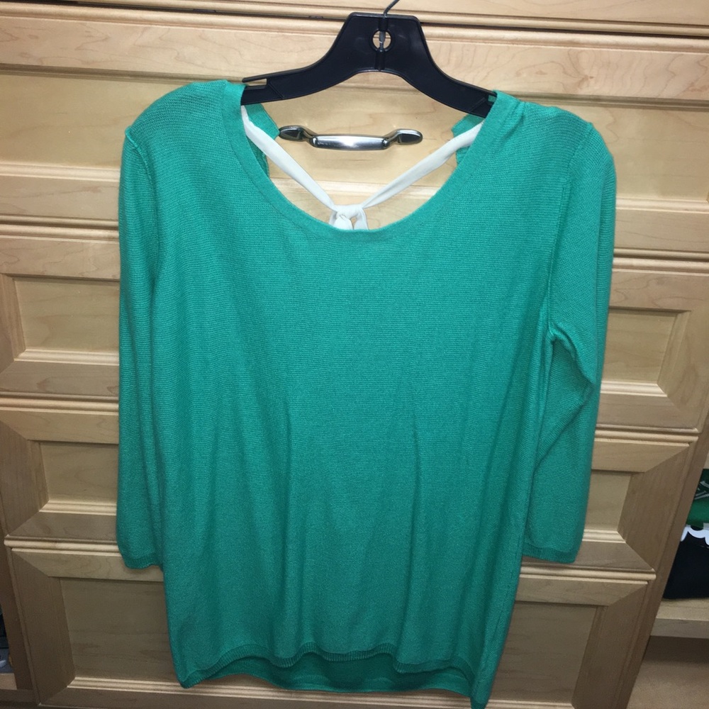 mint sweater with bow back