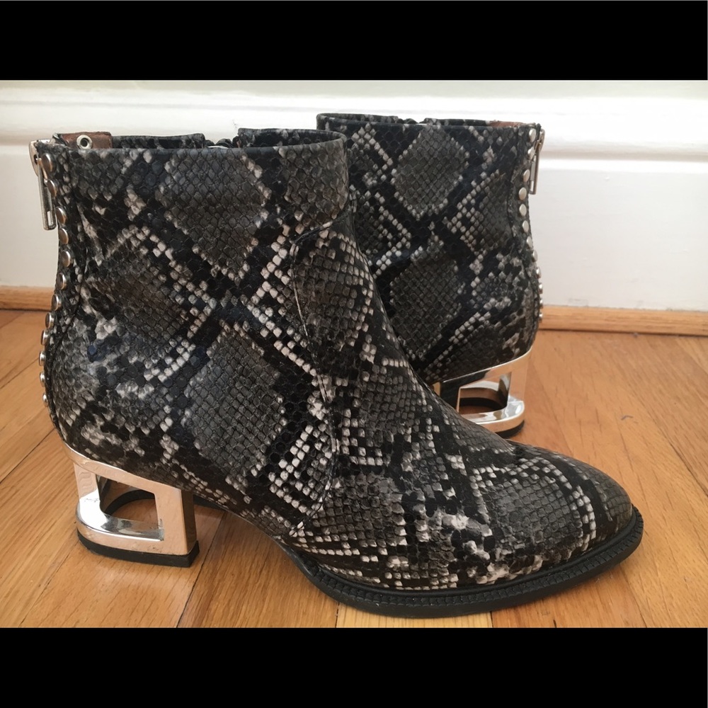 Never worn Jeffrey Campbell snake skin boots