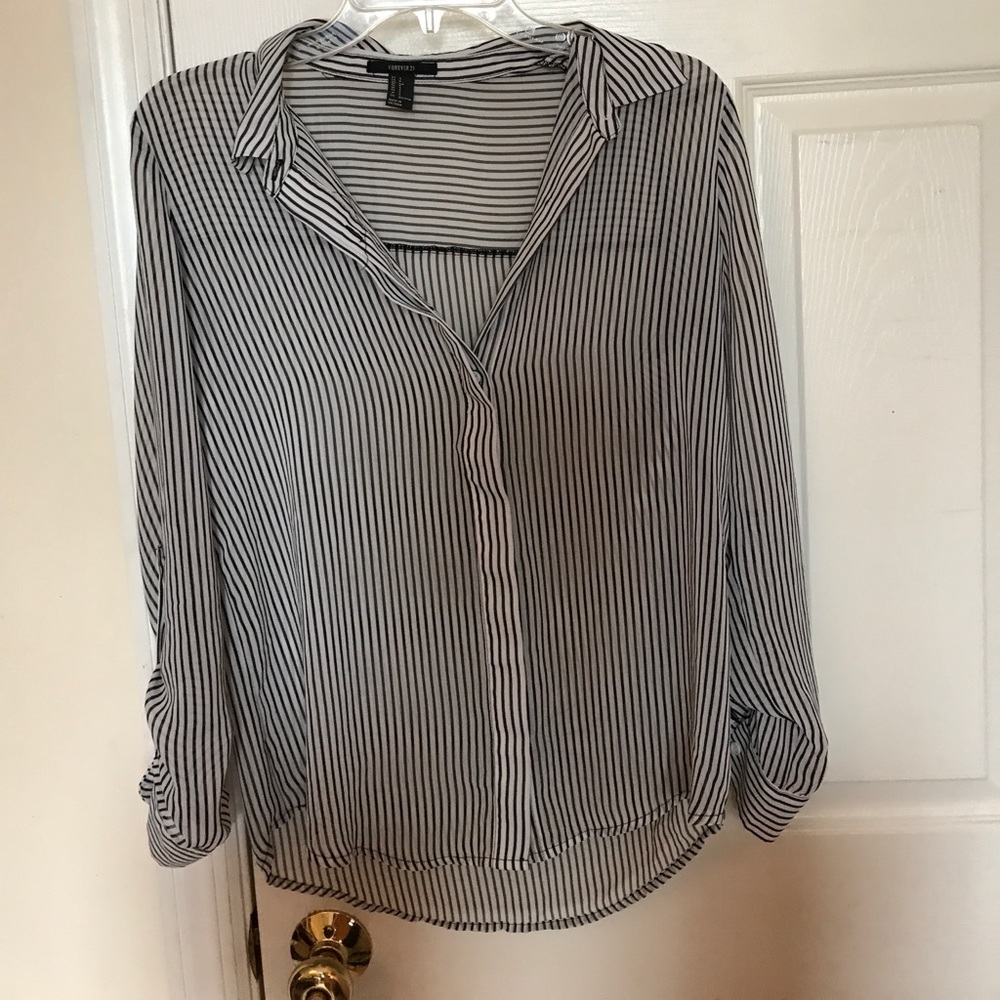 Sheer black and white strip business top