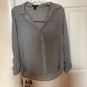 Sheer black and white strip business top