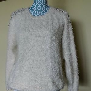 Cream sweater with beaded shoulders