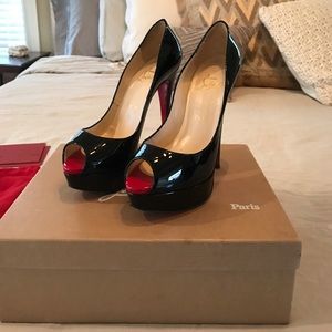 Christian Louboutin Lady Peep shoes.