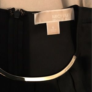 Beautiful silkly Michael kors blouse gold detail