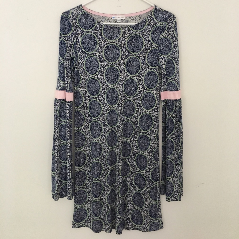 Blue silk dress with pink trim on the elbows