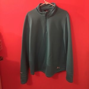 A blue under armor sweat shirt