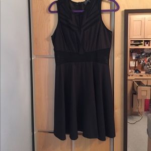 Black dress with mesh filled cut outs