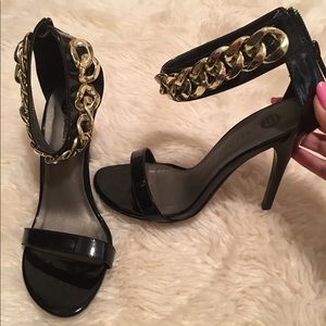 Black heels with gold chains