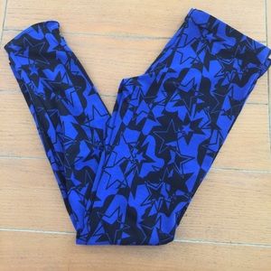 Blue and black leggings. Stars