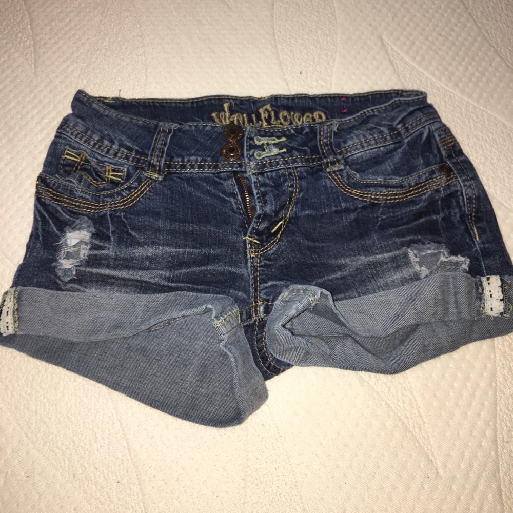 Cute rollup shorts, double button.