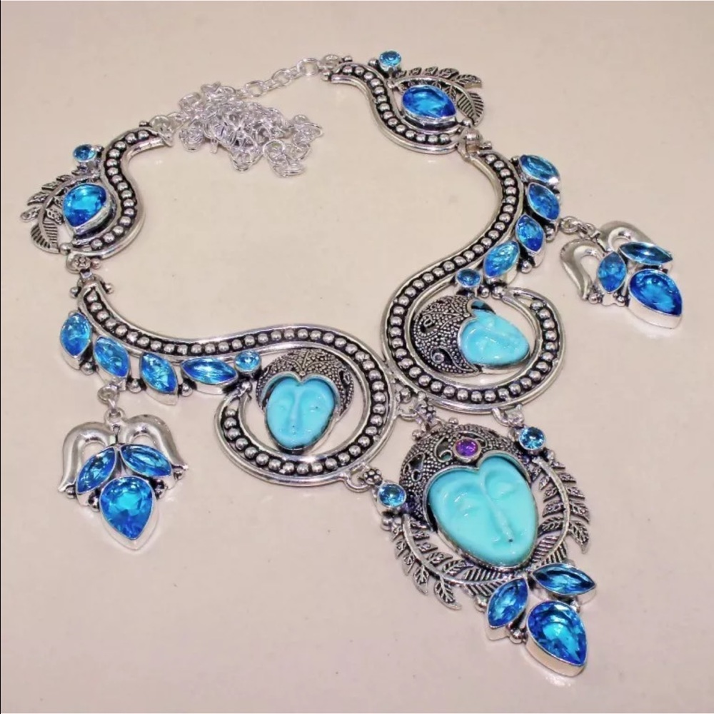 Tibetan Carved Face and London Topaz in 925 silver