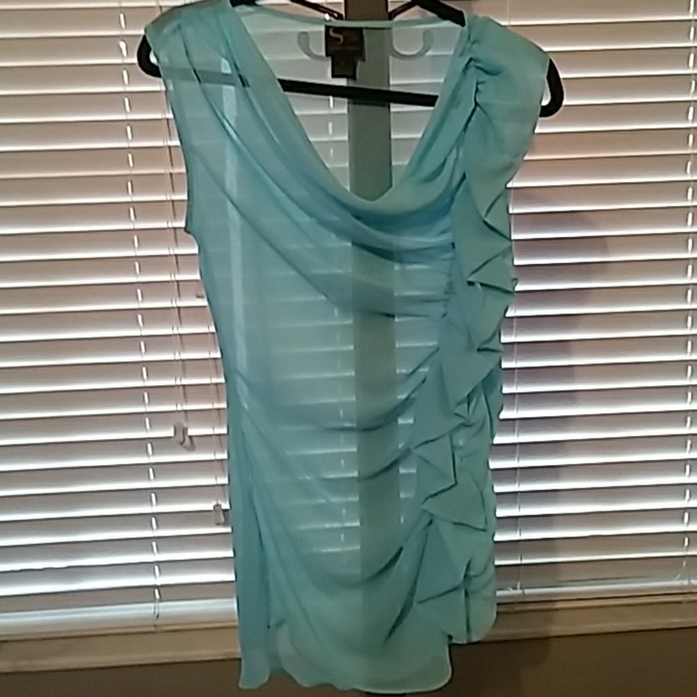 Baby blue blouse with ruffle