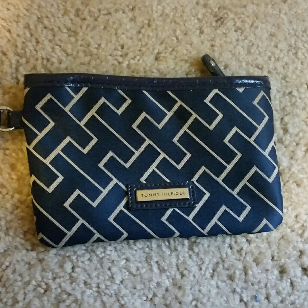A Tommy Hilfiger wristlet used