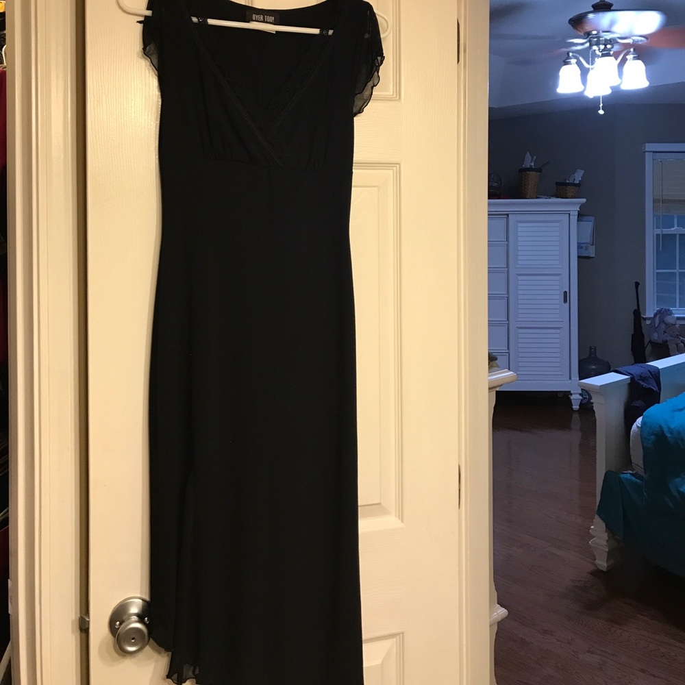 Black evening dress with some lace in the neckline