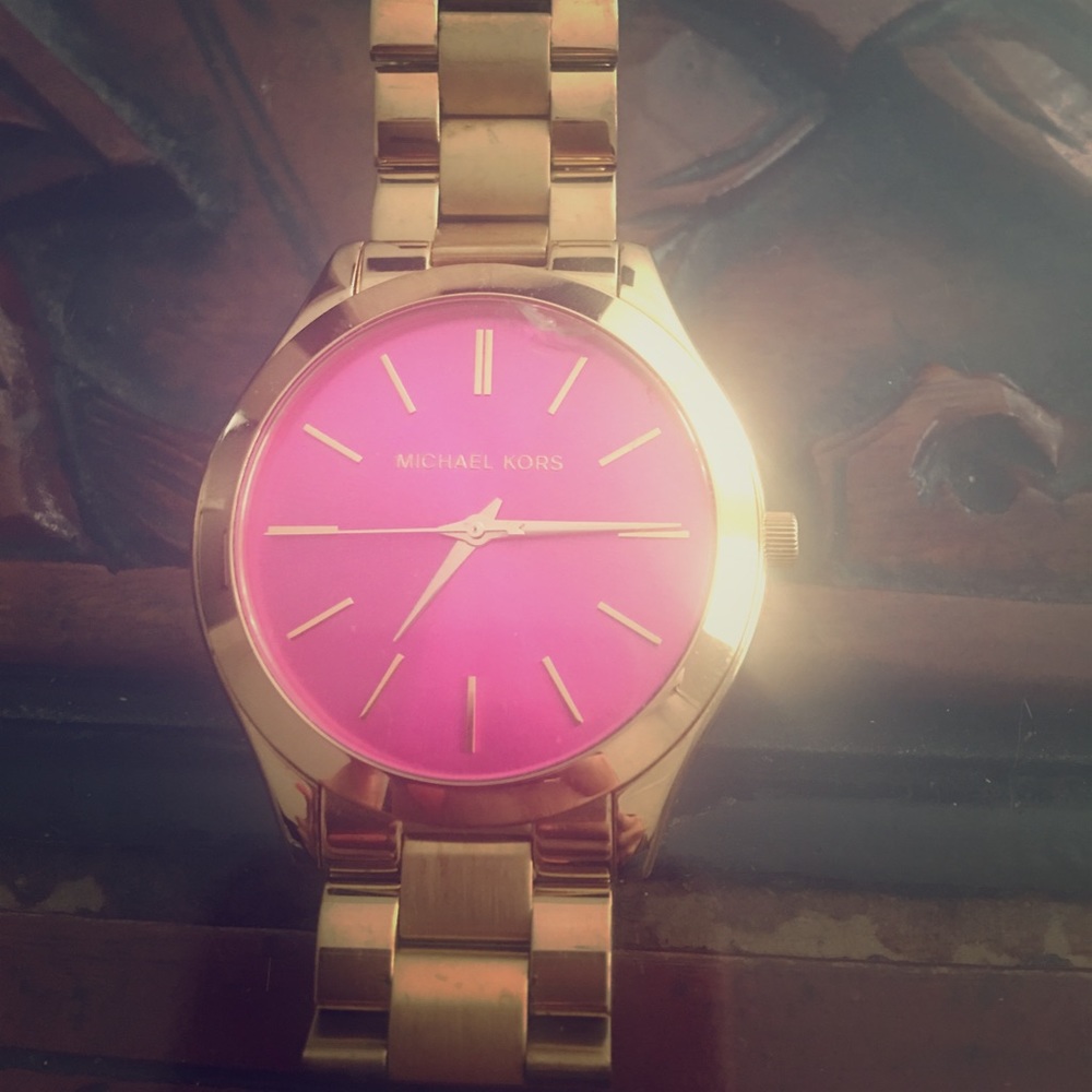 Gold Michael kors watch with hot pink face