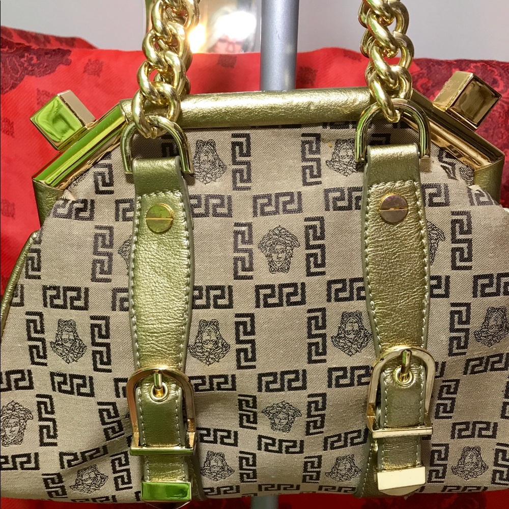 Versace bag bough in Italy