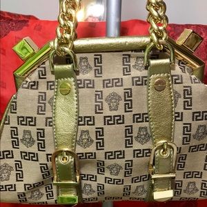 Versace bag bough in Italy
