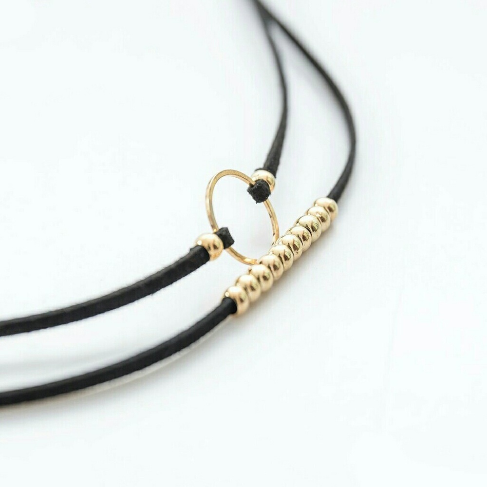 Black and gold choker