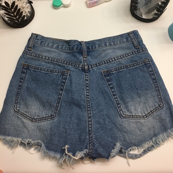 NWOT Ripped denim high waisted jean shorts. - Picture 2 of 6