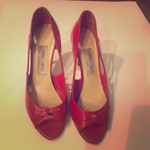 Jimmy Choo red pumps