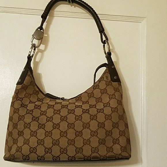 Gucci Handbags - Previously own authentic small Gucci  bag