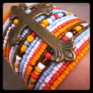 Beaded cuff bracelet with cross