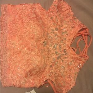 A very cute fancy top , brand new with tag .
