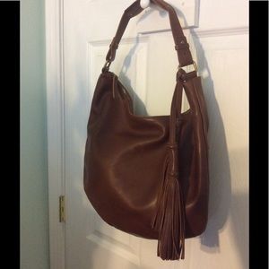 Lucky 🍀 Brand leather handbag.  Brownish color.