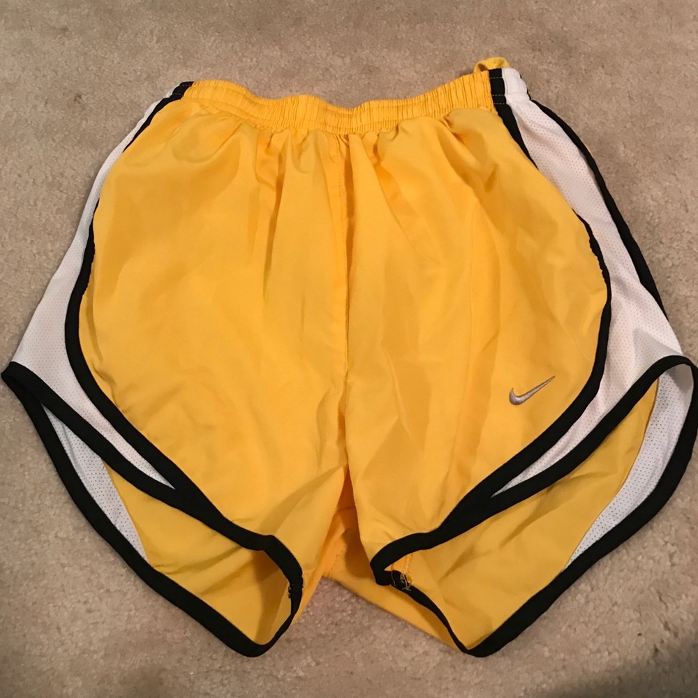 Yellow Nike running shorts XS
