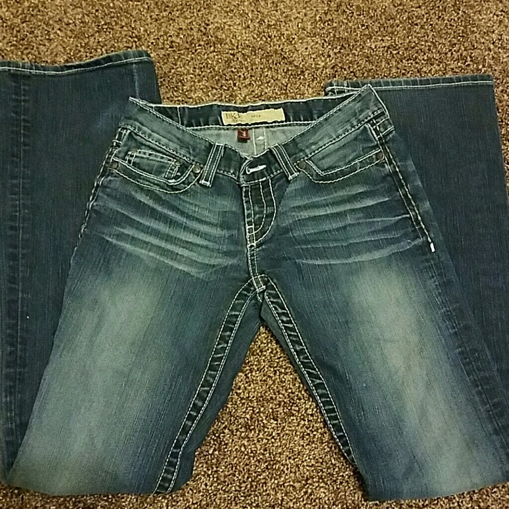 BKE jeans with shotgun holes in the knees