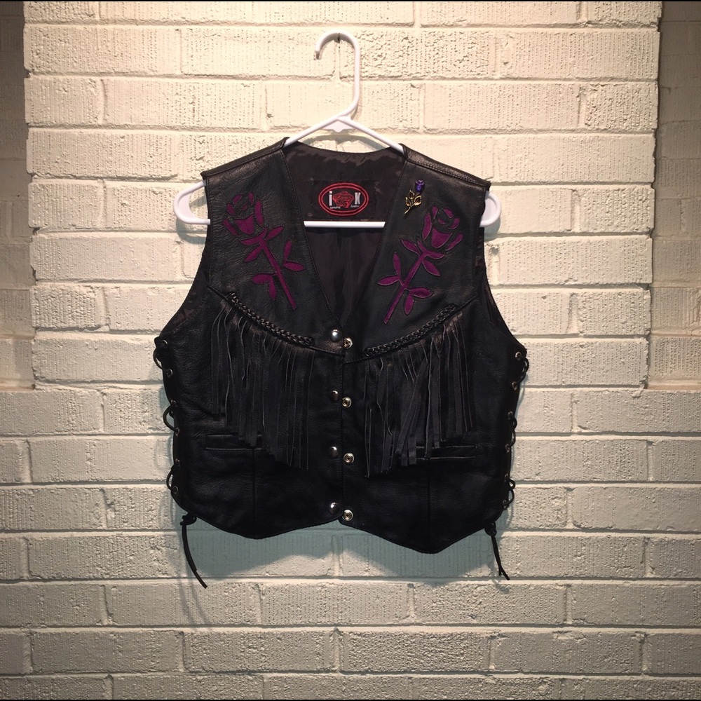 Black leather vest with fringe