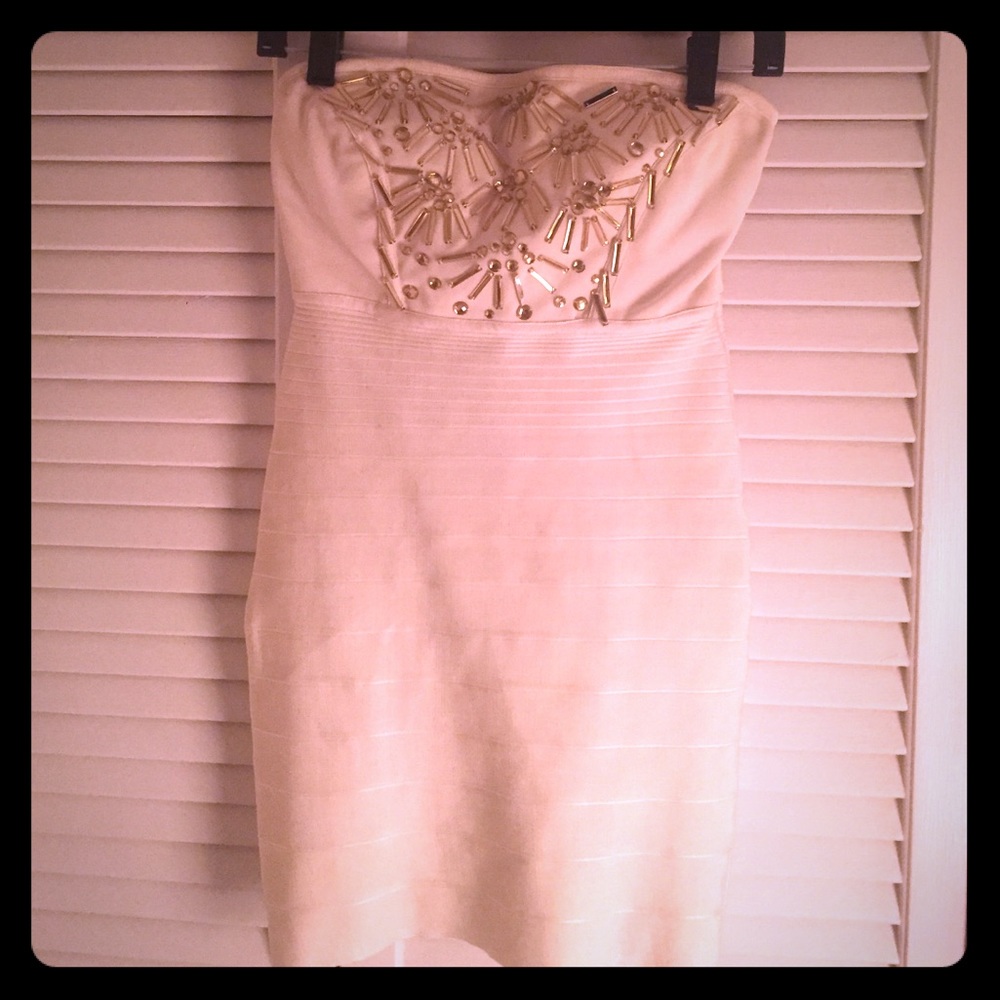 Cream colored dress with gold neckline