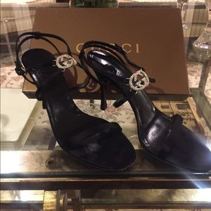 Gucci black strap sandal with Gucci rhinestone
