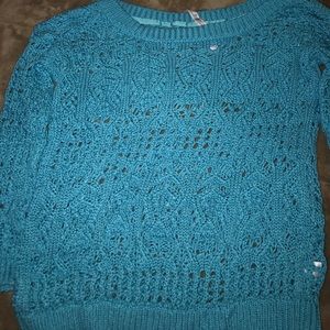 A knit blue sweater / top