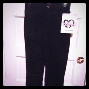 Black leather and suede pants. NEW
