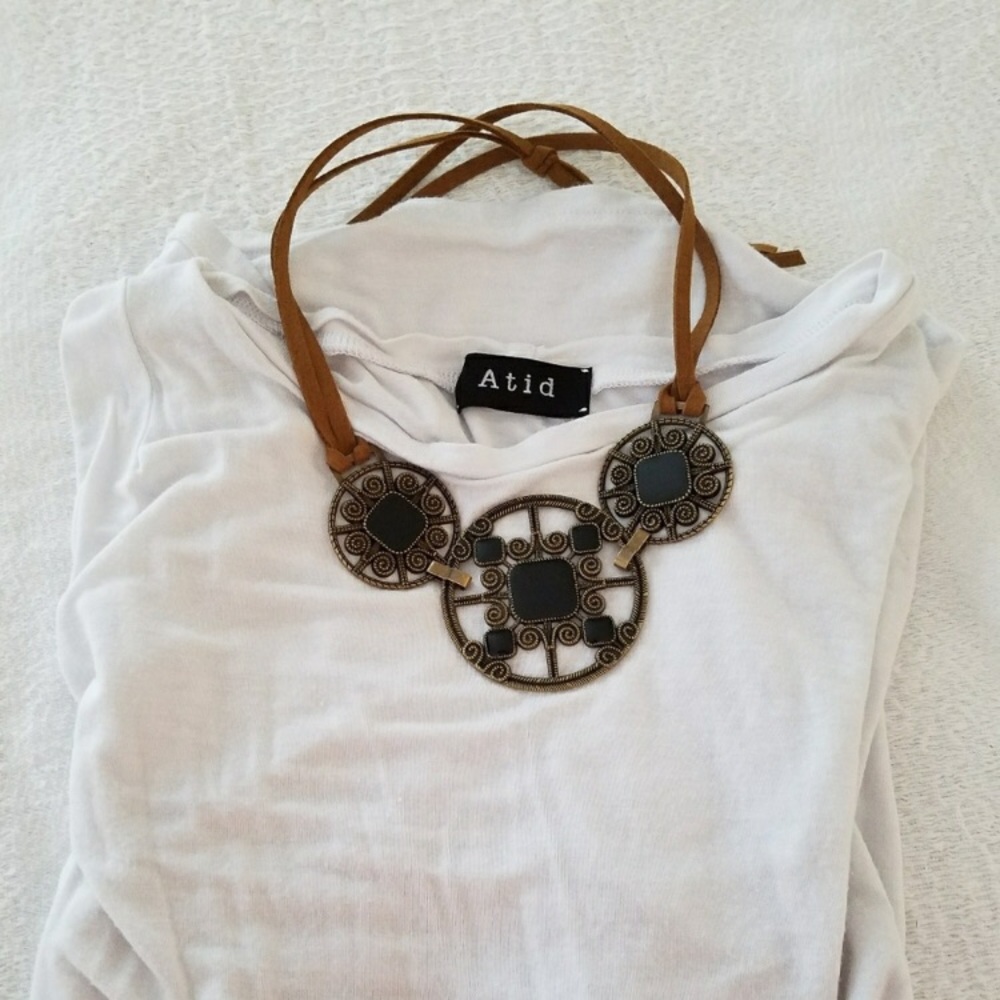 Stunning La Amor soft tobacco color leather neck.