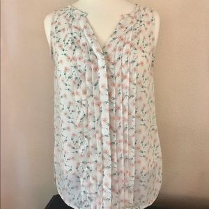 Sheer floral button up sleeveless blouse