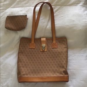 Dooney and Bourke purse with matching makeup case.