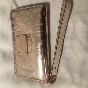 Michael Kors - gold tech wristlet