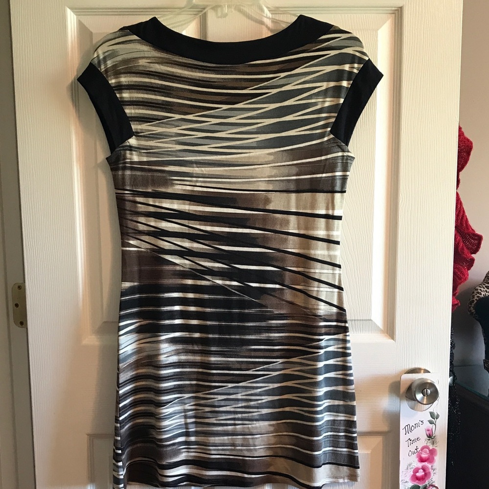 Beautifully designed women's dress by Milano!