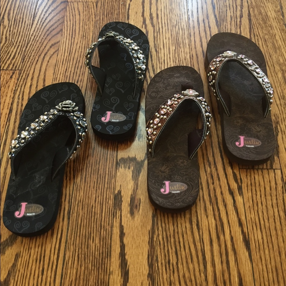 Two pair of rhinestone Justin flip flops.