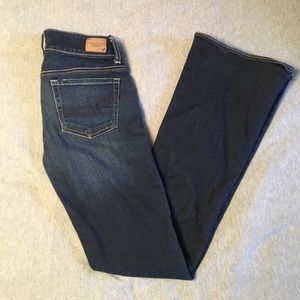 AE artist flare jeans in dark wash. NEVER WORN