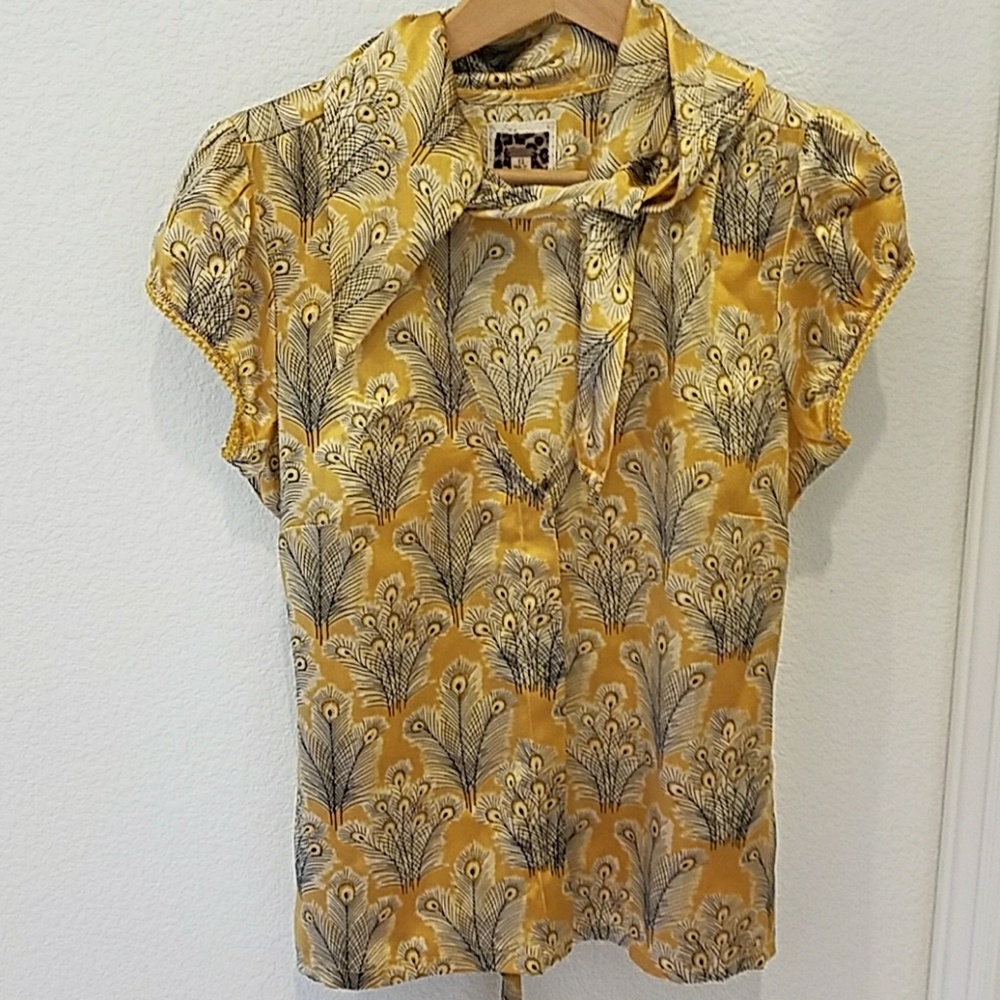Mustard colored silk peacock print top