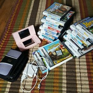 Pink DS with charger, case, and 19 games