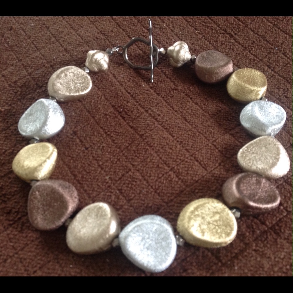 Artisan metallic necklace.