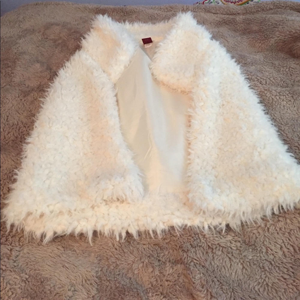 White fur vest, never worn
