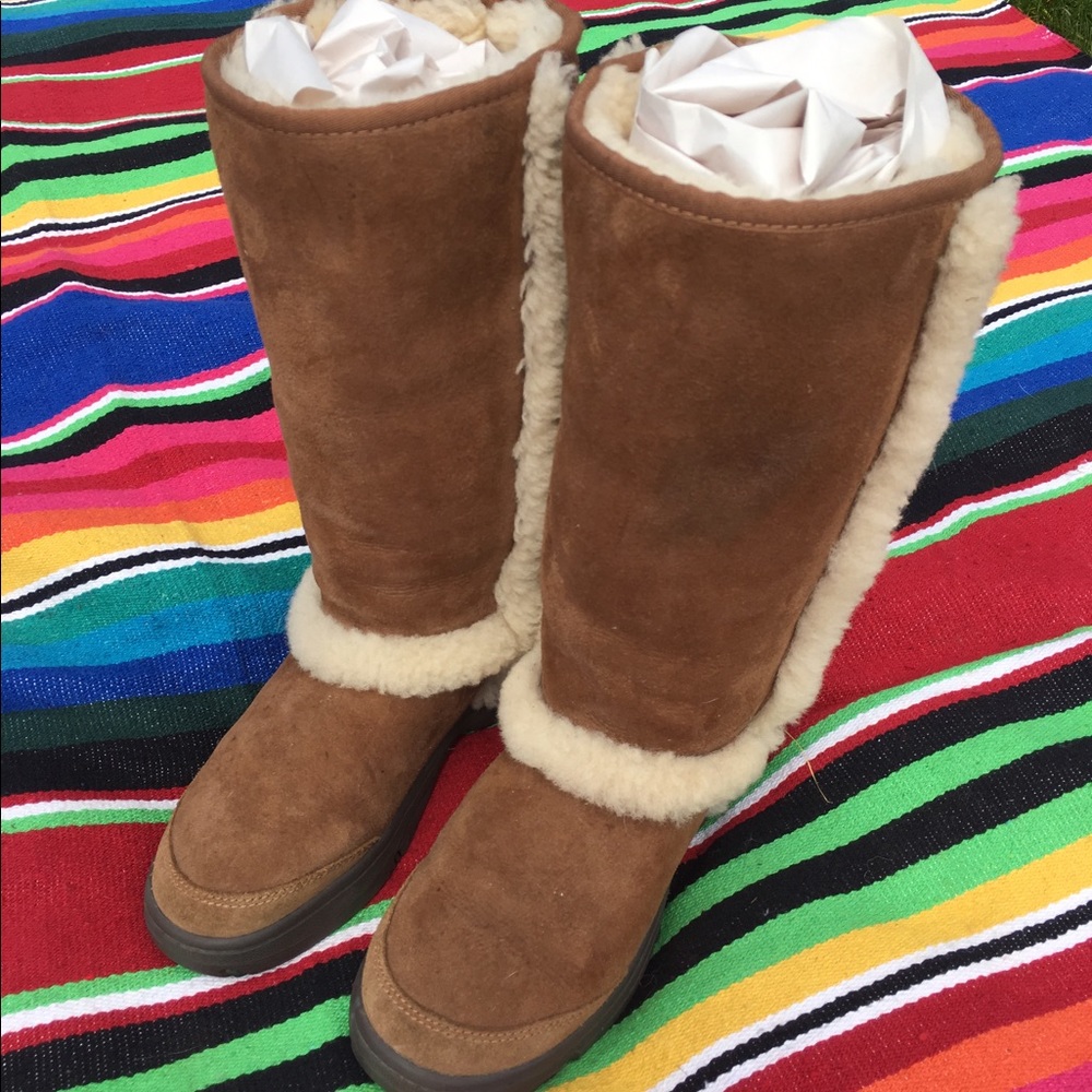 UGG Sunburst, size 7, worn once, no signs of wear.