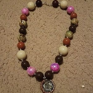 Pink and camouflage beaded necklace.